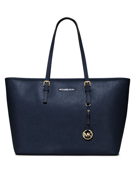 michael kors jet set travel tote blue|Michael Kors bag with airplanes.